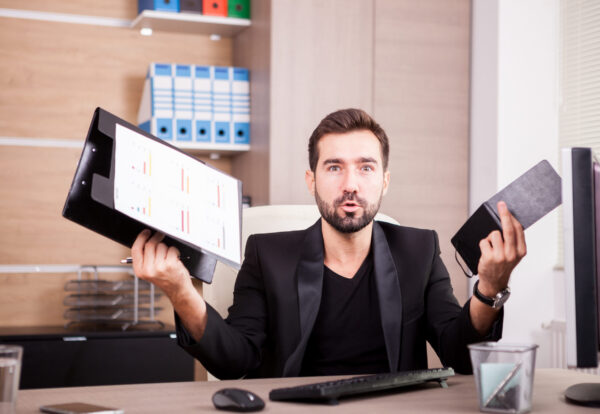 Businessman working in his office Steps to successful loan settlement